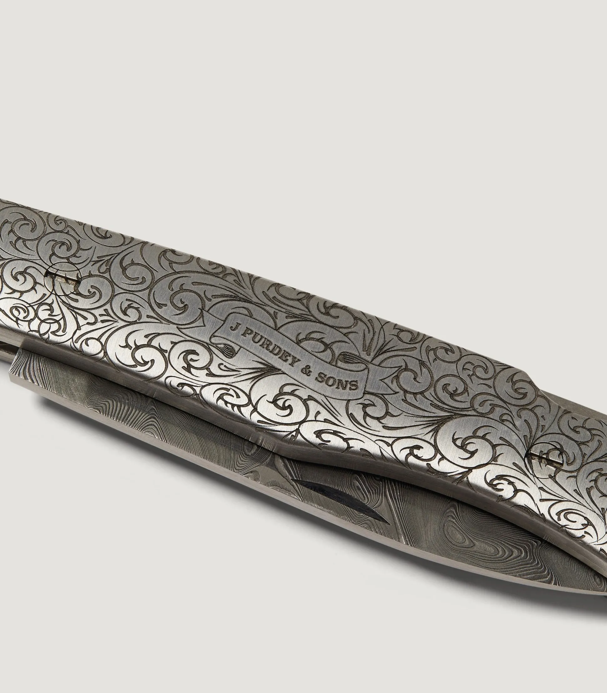 Rose & Scroll Folding Knife